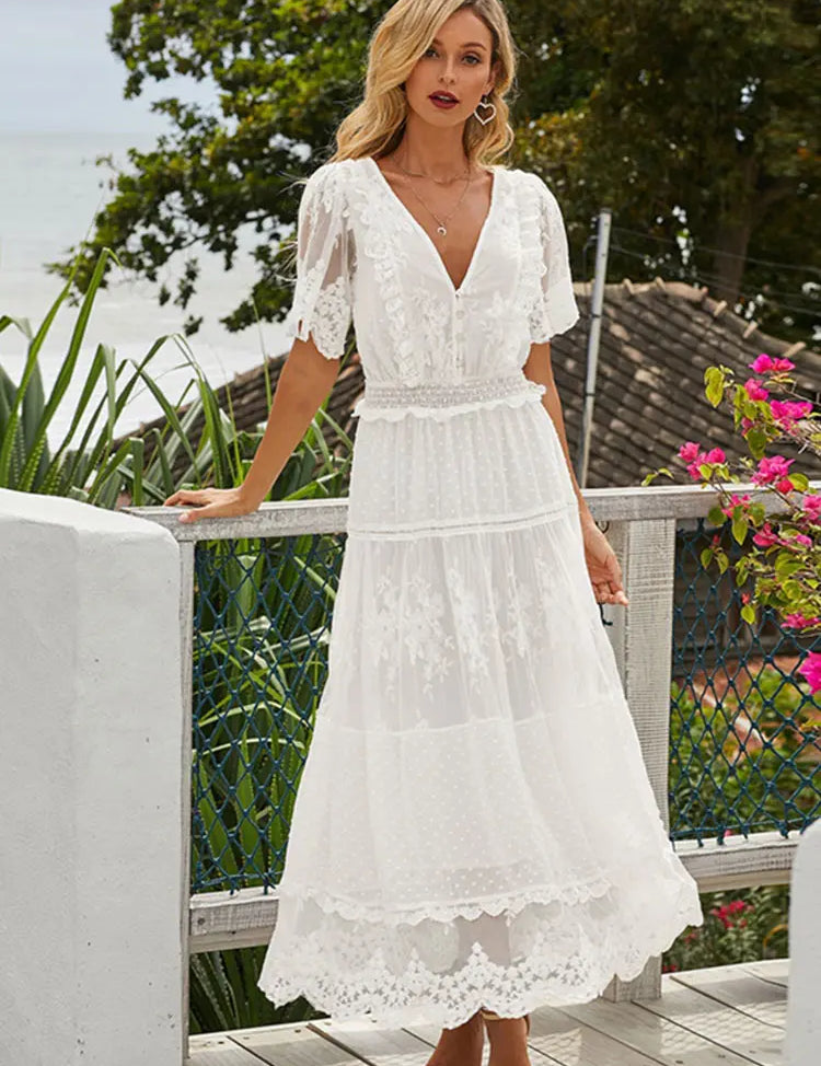 Uitgehold-Witte-Jurk-Sexy-Dames-Kanten-Lange-Jurk-Kruis-Semi-Doorschijnende-V-Hals-Korte-Mouw-Kant_44a1bd93-8d41-4d84-a595-729aad4c0e56.webp
