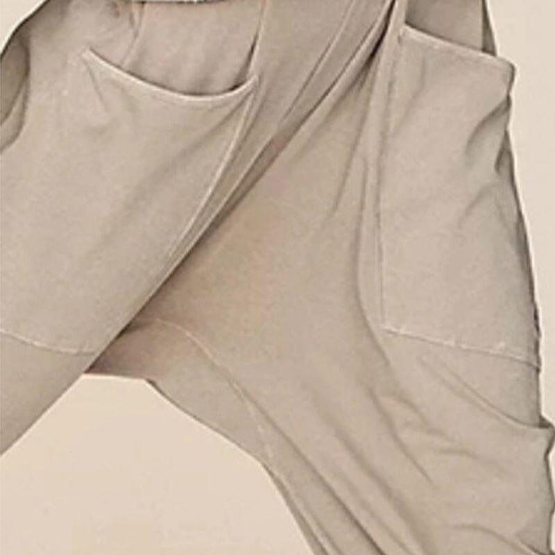 Ishani - Minimalistisk jumpsuit med lommer og V-udskæring